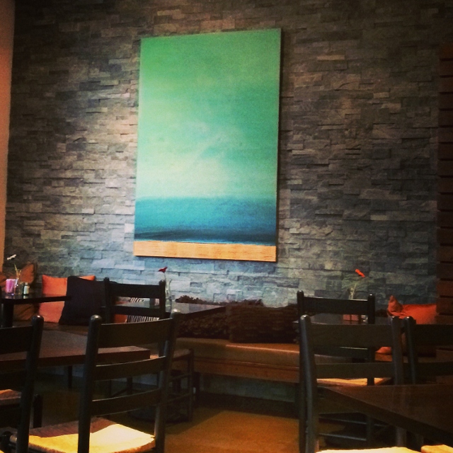 The rustic yet refined atmosphere of Babica Hen is highlighted by eye-catching paintings