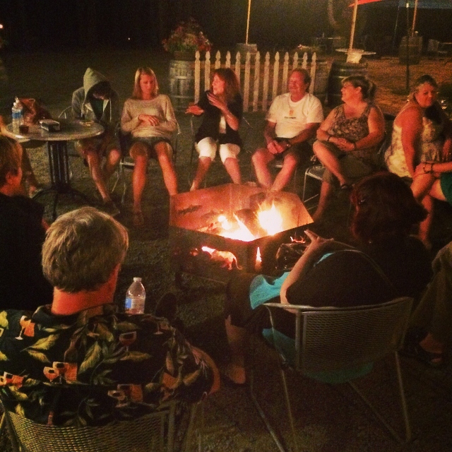Lorrie Normann tells a ghost story during the marshmallow roast and bonfire.
